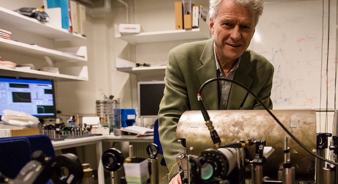 Eugene Simon Polzik in his lab working with quantum bits of light. By Eugene Simon Polzik
