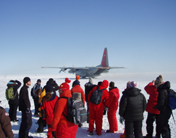 Crew waiting for plane to land on the ice