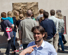 People observing the relief