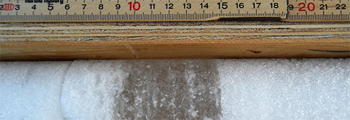 The 5-6 cm thick melt layer of ice found in the shallow core at about 11 meters’ depth.